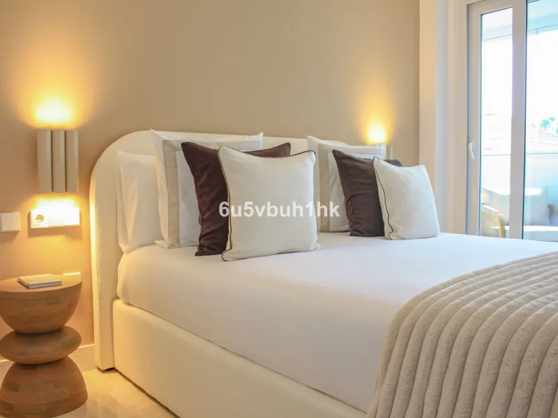 Located on Marbella's prestigious Golden Mile, this refined apartment in Las Cañas Beach perfectly balances timeless elegance with the comfort of a true home. Recently renovated and thoughtfully furnished with premium materials, it's offered exactly as it