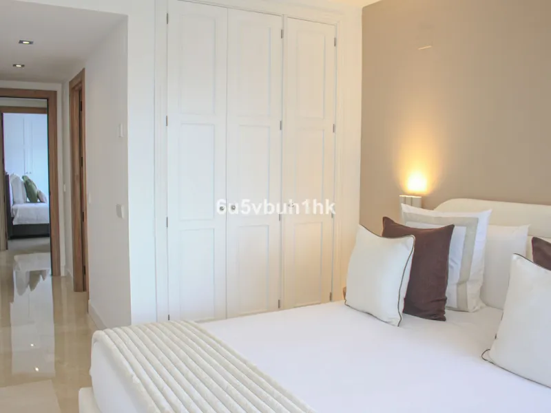Located on Marbella's prestigious Golden Mile, this refined apartment in Las Cañas Beach perfectly balances timeless elegance with the comfort of a true home. Recently renovated and thoughtfully furnished with premium materials, it's offered exactly as it