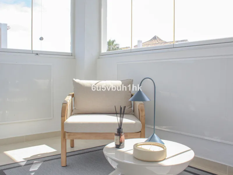 Located on Marbella's prestigious Golden Mile, this refined apartment in Las Cañas Beach perfectly balances timeless elegance with the comfort of a true home. Recently renovated and thoughtfully furnished with premium materials, it's offered exactly as it