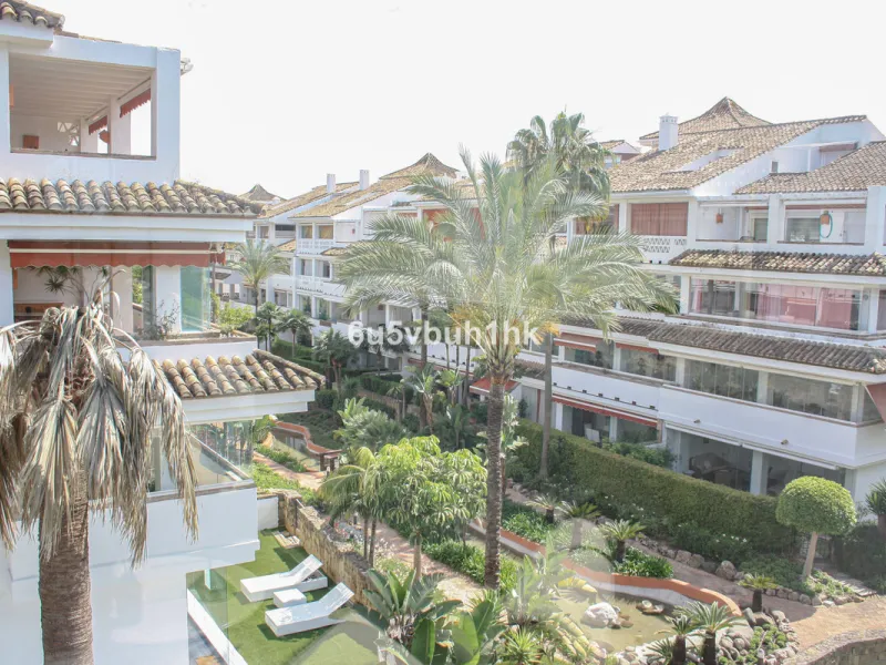 Located on Marbella's prestigious Golden Mile, this refined apartment in Las Cañas Beach perfectly balances timeless elegance with the comfort of a true home. Recently renovated and thoughtfully furnished with premium materials, it's offered exactly as it