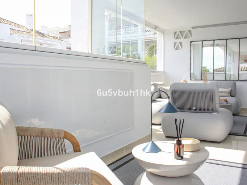 Located on Marbella's prestigious Golden Mile, this refined apartment in Las Cañas Beach perfectly balances timeless elegance with the comfort of a true home. Recently renovated and thoughtfully furnished with premium materials, it's offered exactly as it