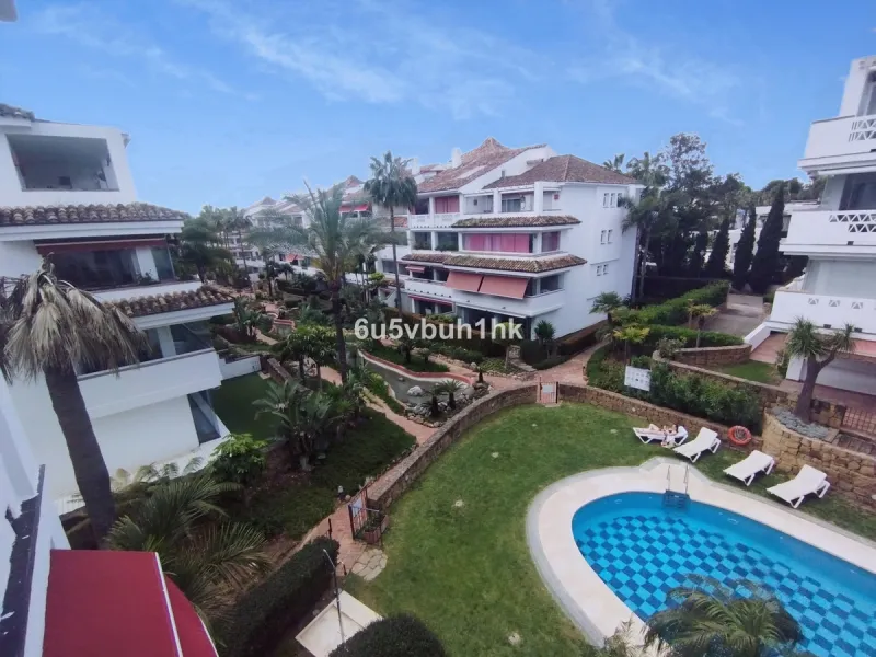 Located on Marbella's prestigious Golden Mile, this refined apartment in Las Cañas Beach perfectly balances timeless elegance with the comfort of a true home. Recently renovated and thoughtfully furnished with premium materials, it's offered exactly as it