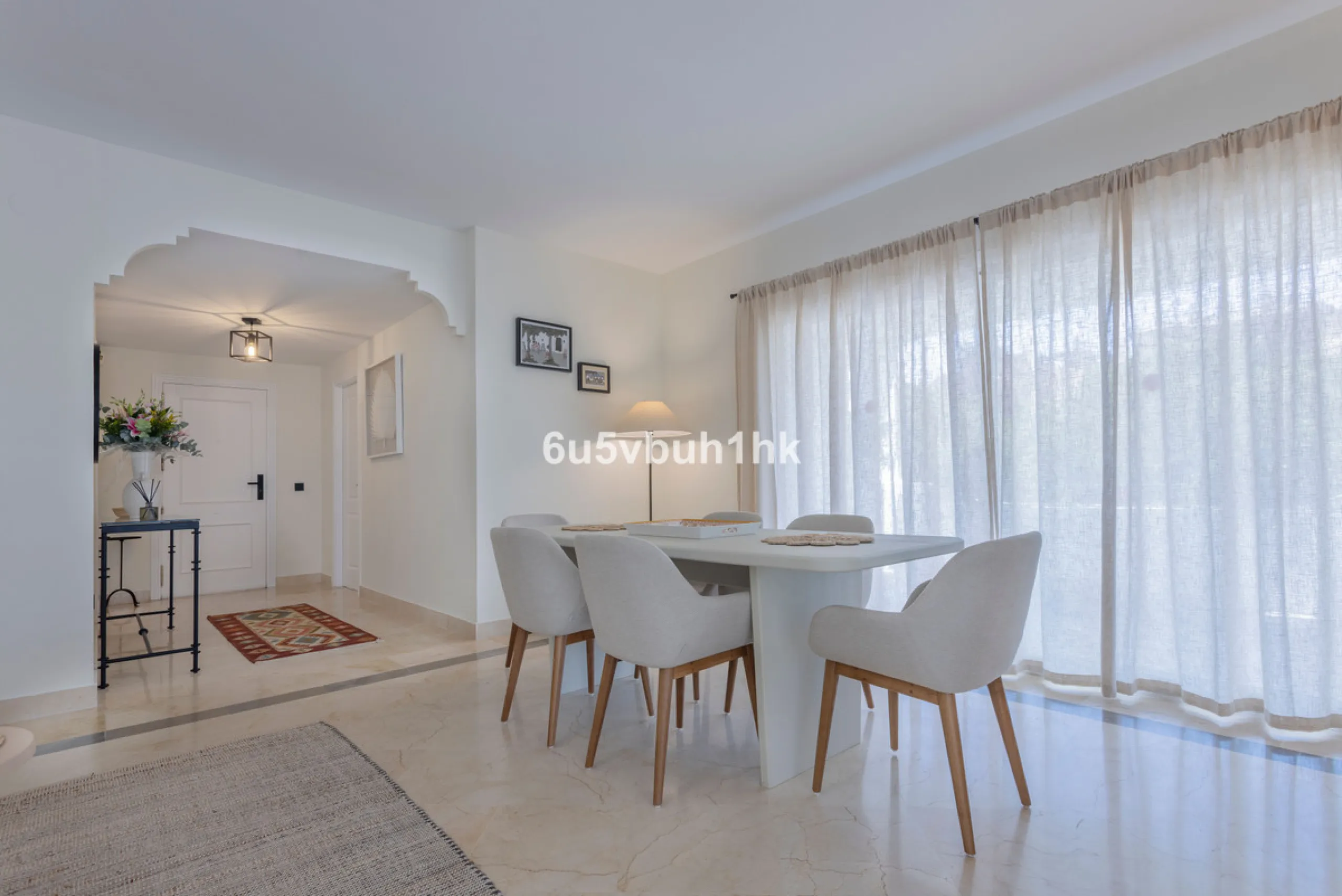 Fully renovated and beautifully presented, this home immediately impresses with a welcoming entrance hall that leads to a spacious, separate kitchen with an adjoining laundry area. From here, you step into a bright and airy open-plan living and dining spa