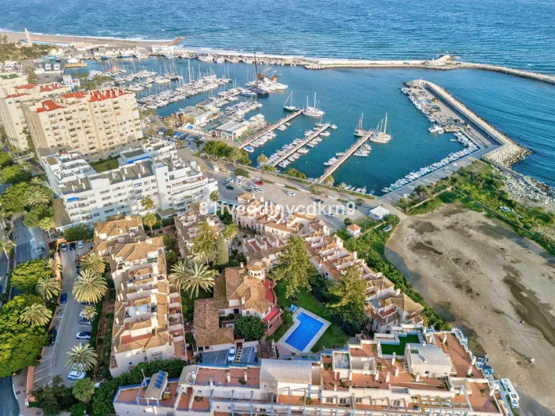 Presenting an exceptional duplex sanctuary nestled within the prestigious Belgravia complex, mere steps from Estepona's vibrant harbor and sun-kissed shores. Originally conceived as separate ground-floor and mezzanine units, this residence has been master