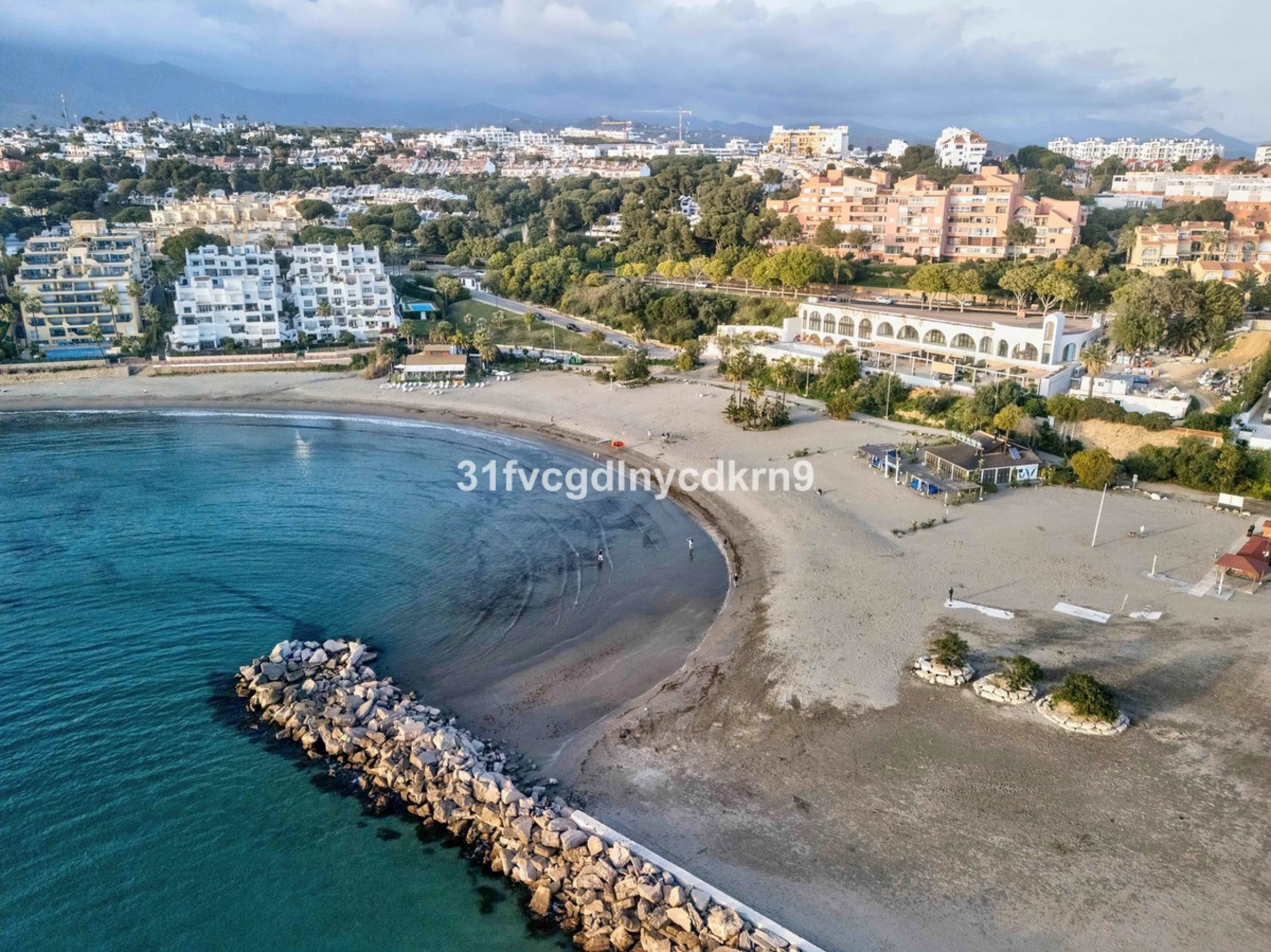 Presenting an exceptional duplex sanctuary nestled within the prestigious Belgravia complex, mere steps from Estepona's vibrant harbor and sun-kissed shores. Originally conceived as separate ground-floor and mezzanine units, this residence has been master