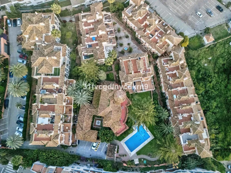 Presenting an exceptional duplex sanctuary nestled within the prestigious Belgravia complex, mere steps from Estepona's vibrant harbor and sun-kissed shores. Originally conceived as separate ground-floor and mezzanine units, this residence has been master