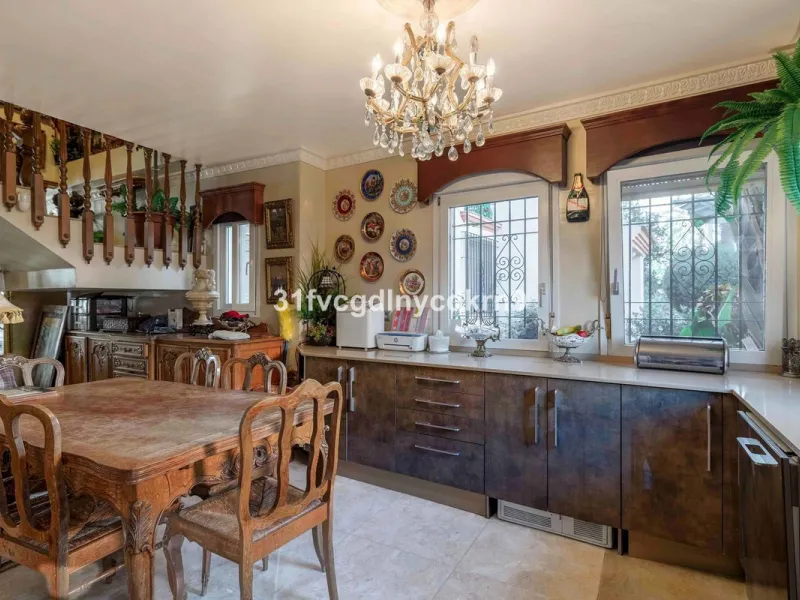 Presenting an exceptional duplex sanctuary nestled within the prestigious Belgravia complex, mere steps from Estepona's vibrant harbor and sun-kissed shores. Originally conceived as separate ground-floor and mezzanine units, this residence has been master