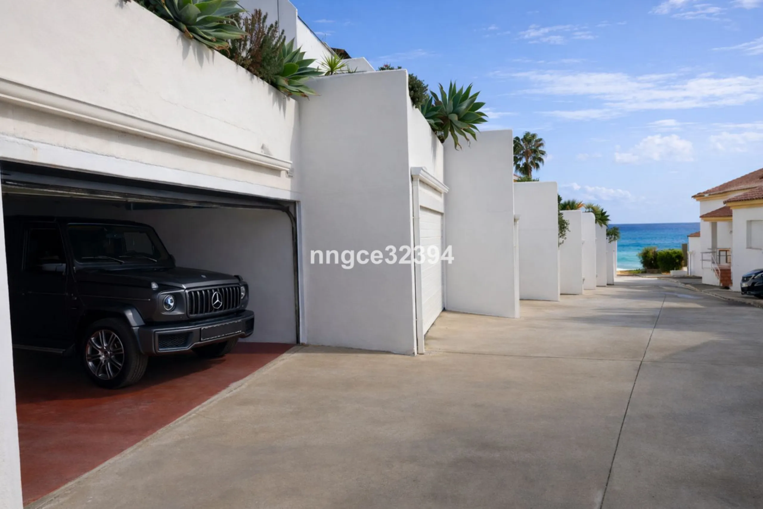 Spacious Seaview Beachfront Townhouse with Attached Multicar Garage, Solarium, and Versatile Bonus Rooms