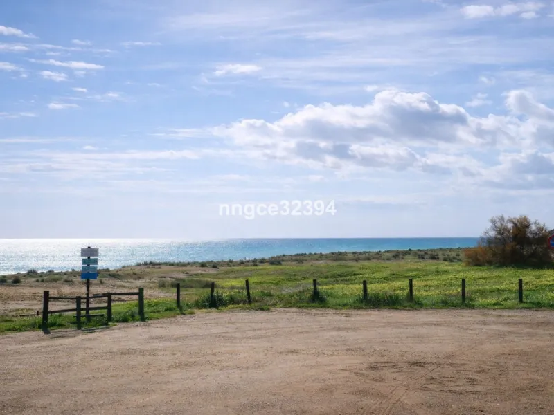 Spacious Seaview Beachfront Townhouse with Attached Multicar Garage, Solarium, and Versatile Bonus Rooms