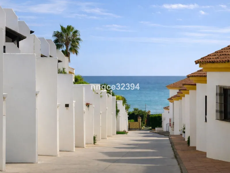 Spacious Seaview Beachfront Townhouse with Attached Multicar Garage, Solarium, and Versatile Bonus Rooms
