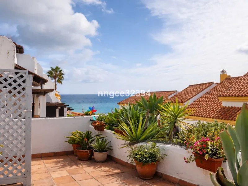Spacious Seaview Beachfront Townhouse with Attached Multicar Garage, Solarium, and Versatile Bonus Rooms