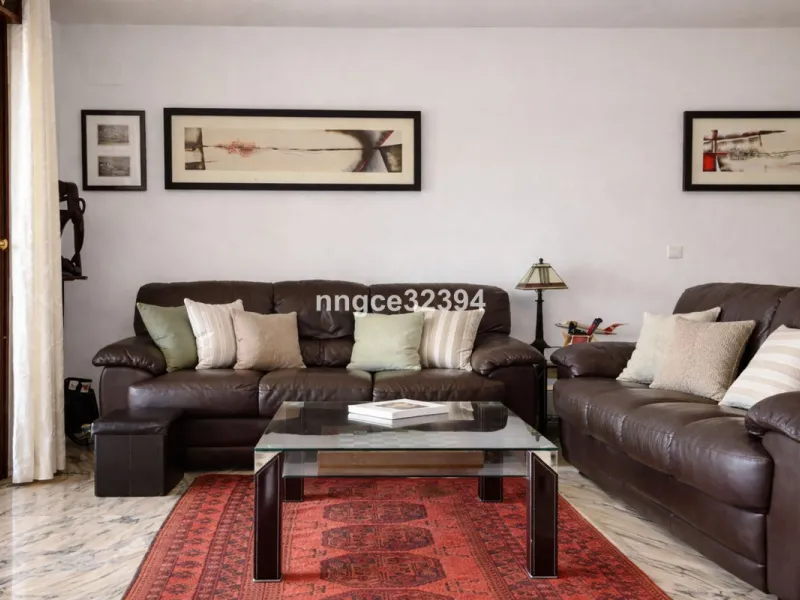 Spacious Seaview Beachfront Townhouse with Attached Multicar Garage, Solarium, and Versatile Bonus Rooms