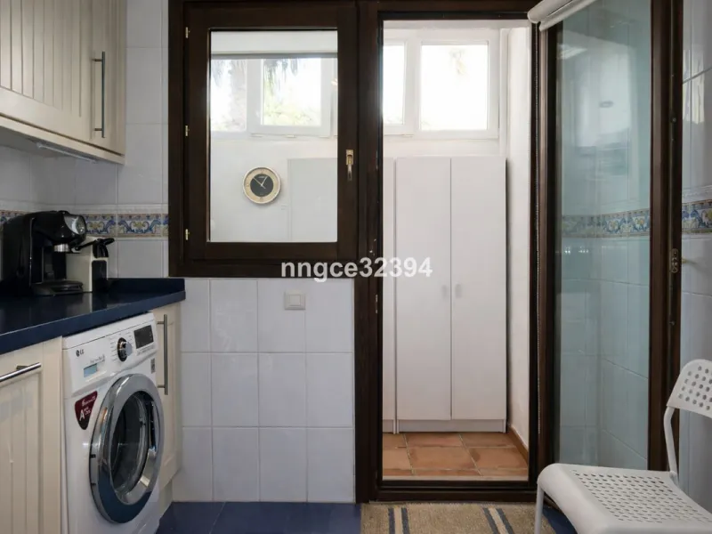 Spacious Seaview Beachfront Townhouse with Attached Multicar Garage, Solarium, and Versatile Bonus Rooms
