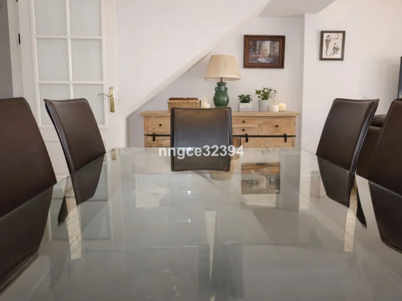 Spacious Seaview Beachfront Townhouse with Attached Multicar Garage, Solarium, and Versatile Bonus Rooms