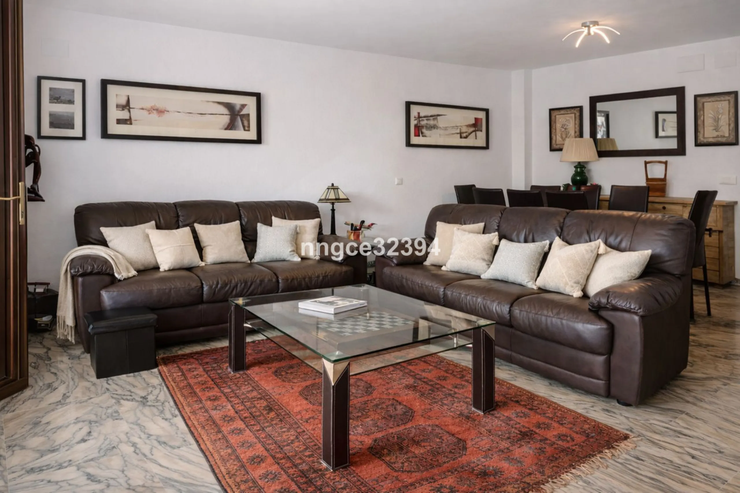 Spacious Seaview Beachfront Townhouse with Attached Multicar Garage, Solarium, and Versatile Bonus Rooms