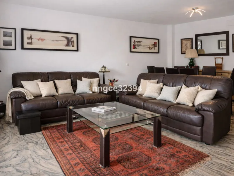 Spacious Seaview Beachfront Townhouse with Attached Multicar Garage, Solarium, and Versatile Bonus Rooms