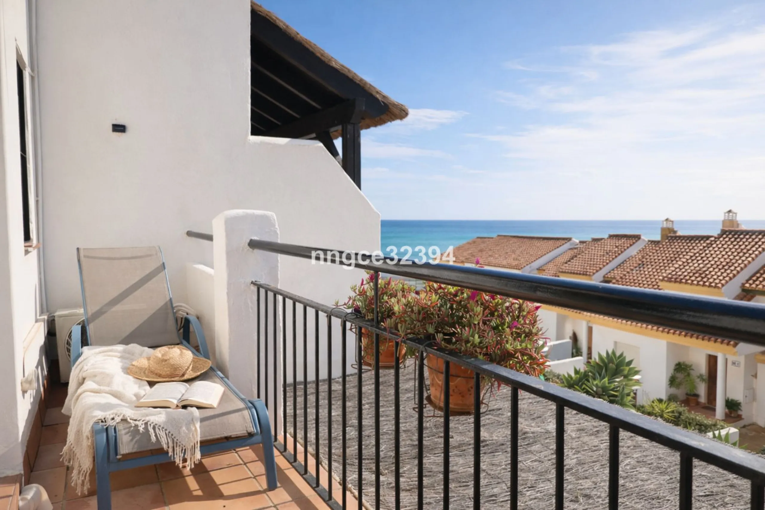 Spacious Seaview Beachfront Townhouse with Attached Multicar Garage, Solarium, and Versatile Bonus Rooms