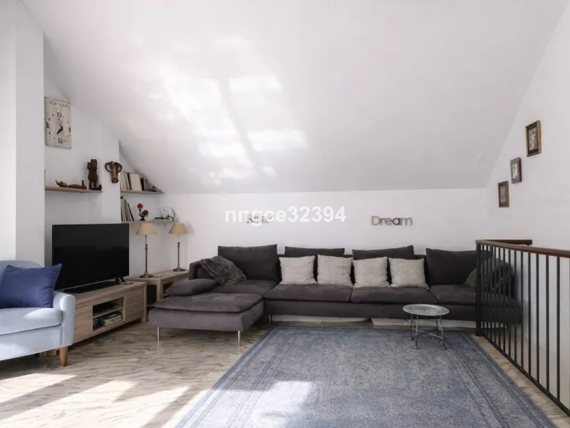 Spacious Seaview Beachfront Townhouse with Attached Multicar Garage, Solarium, and Versatile Bonus Rooms
