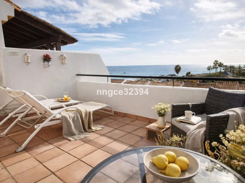 Spacious Seaview Beachfront Townhouse with Attached Multicar Garage, Solarium, and Versatile Bonus Rooms