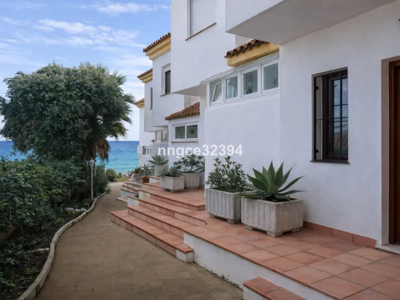 Spacious Seaview Beachfront Townhouse with Attached Multicar Garage, Solarium, and Versatile Bonus Rooms