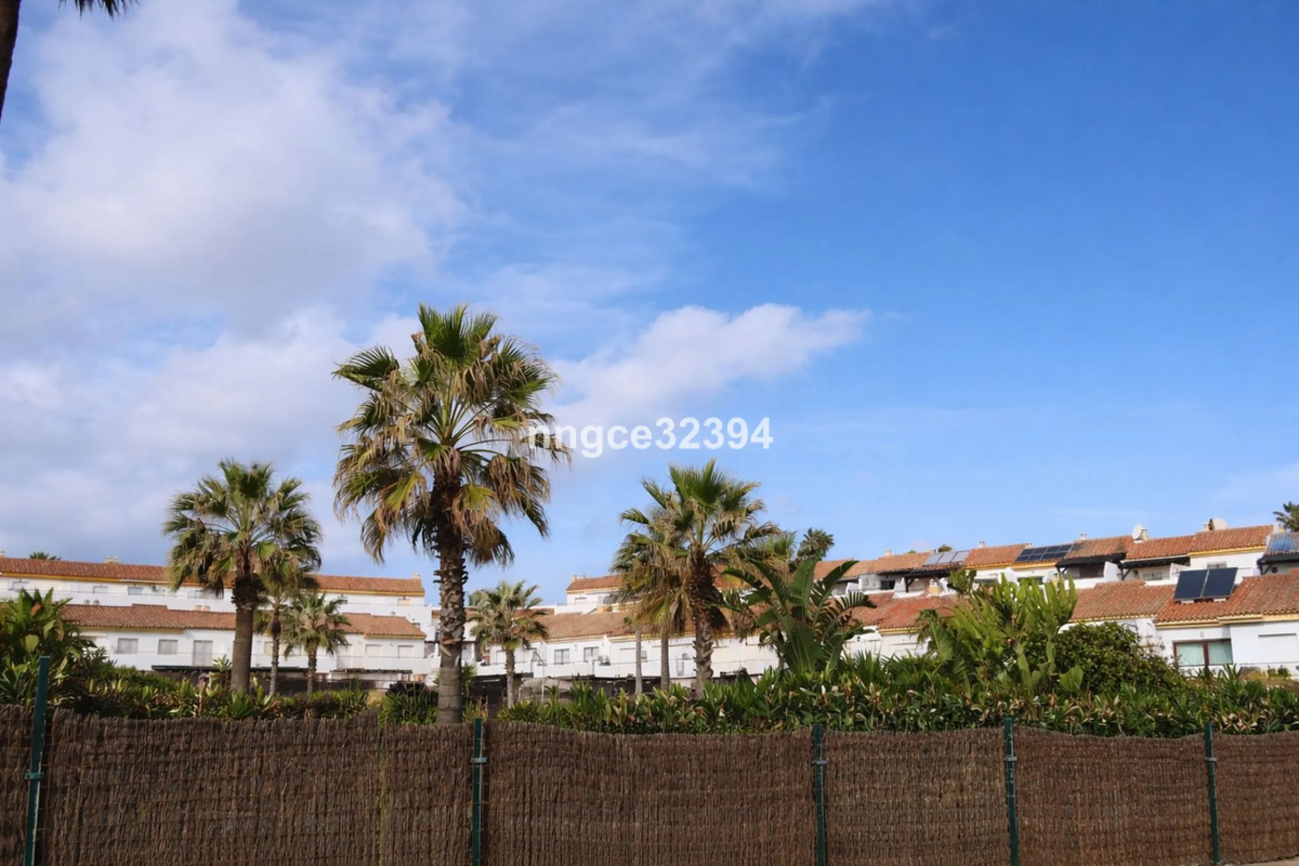 Spacious Seaview Beachfront Townhouse with Attached Multicar Garage, Solarium, and Versatile Bonus Rooms