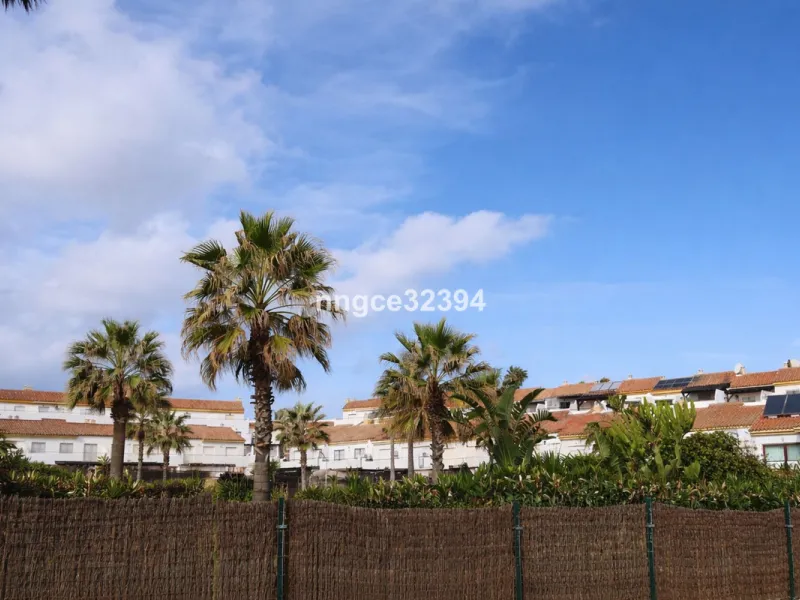 Spacious Seaview Beachfront Townhouse with Attached Multicar Garage, Solarium, and Versatile Bonus Rooms