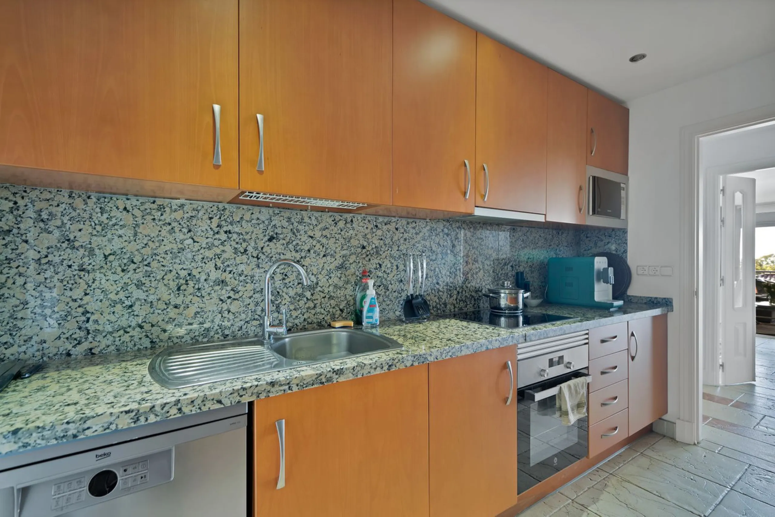 We are delighted to present a rare opportunity within one of Estepona's most sought-after gated communities: Benatalaya, in Atalaya.