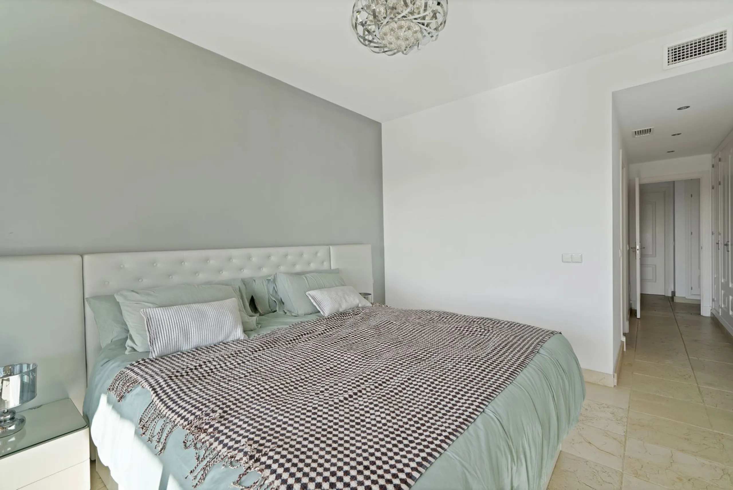 We are delighted to present a rare opportunity within one of Estepona's most sought-after gated communities: Benatalaya, in Atalaya.