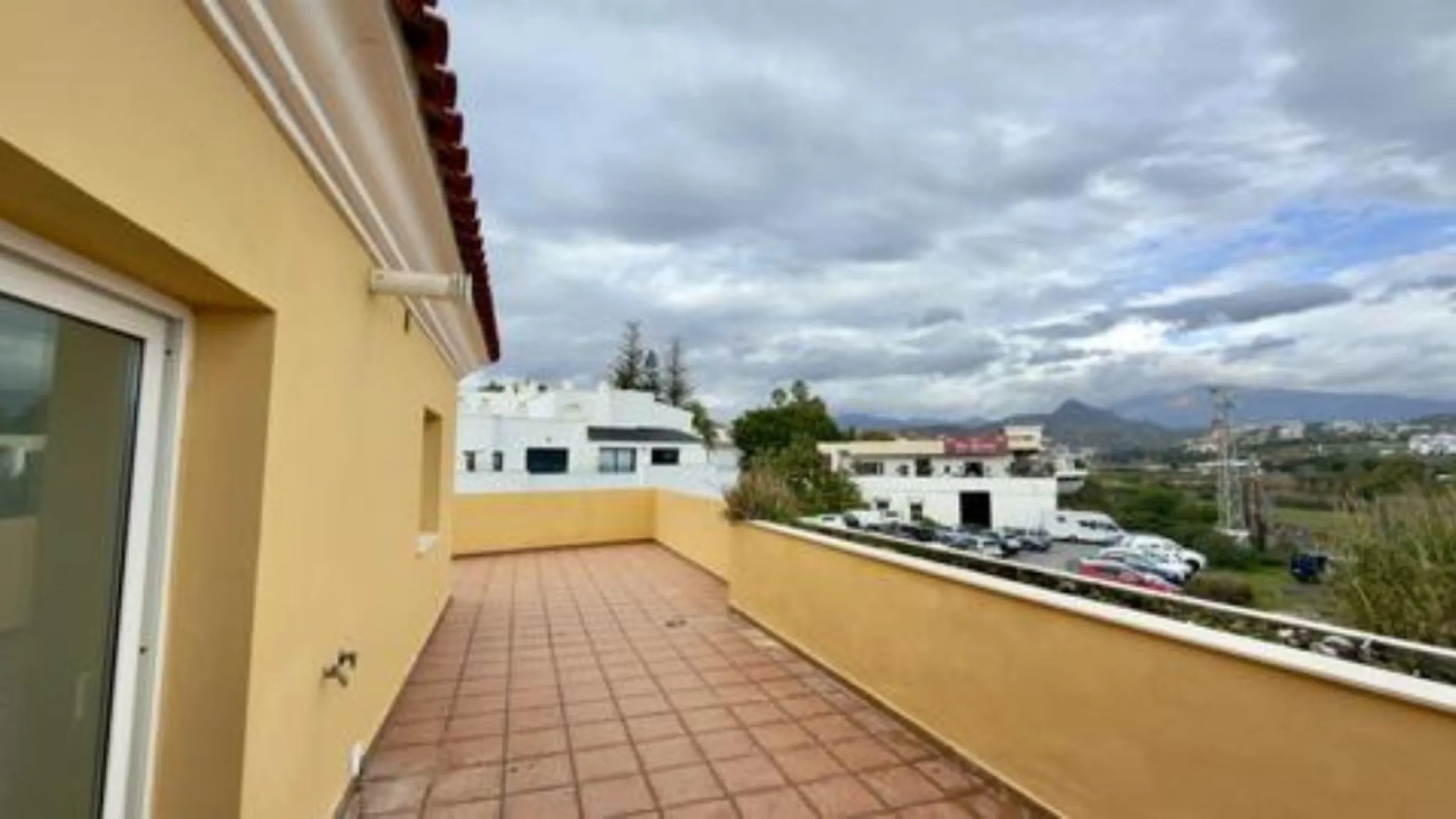 Exclusive penthouse for sale in Cancelada, Estepona, ideal for those seeking to enjoy the Costa del Sol lifestyle with generous outdoor space and a privileged location. The property stands out for its impressive terrace of approximately 80 m² with open vi