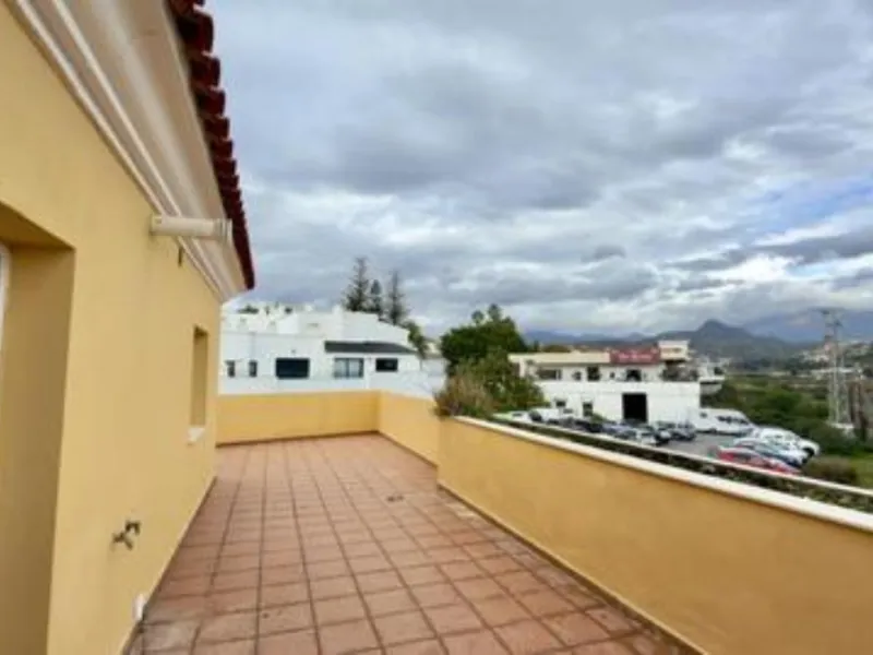Exclusive penthouse for sale in Cancelada, Estepona, ideal for those seeking to enjoy the Costa del Sol lifestyle with generous outdoor space and a privileged location. The property stands out for its impressive terrace of approximately 80 m² with open vi