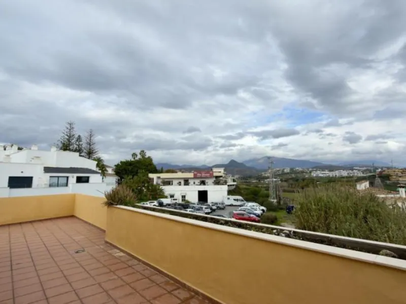 Exclusive penthouse for sale in Cancelada, Estepona, ideal for those seeking to enjoy the Costa del Sol lifestyle with generous outdoor space and a privileged location. The property stands out for its impressive terrace of approximately 80 m² with open vi