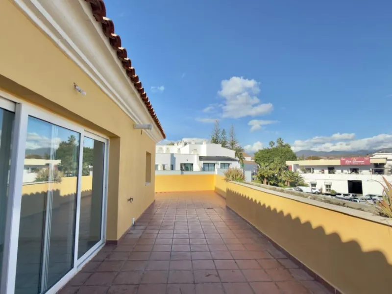 Exclusive penthouse for sale in Cancelada, Estepona, ideal for those seeking to enjoy the Costa del Sol lifestyle with generous outdoor space and a privileged location. The property stands out for its impressive terrace of approximately 80 m² with open vi