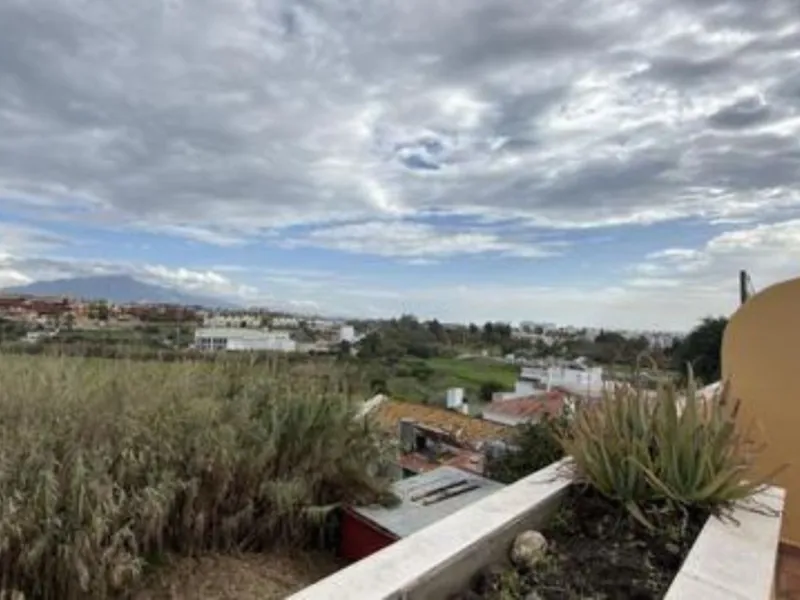 Exclusive penthouse for sale in Cancelada, Estepona, ideal for those seeking to enjoy the Costa del Sol lifestyle with generous outdoor space and a privileged location. The property stands out for its impressive terrace of approximately 80 m² with open vi