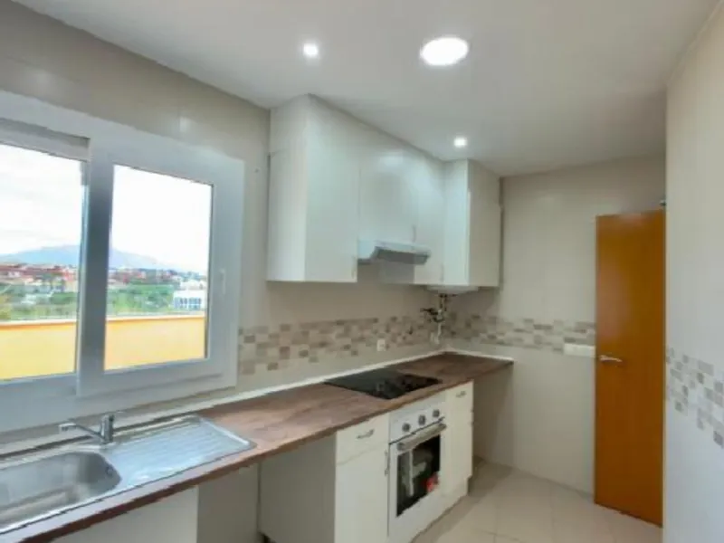 Exclusive penthouse for sale in Cancelada, Estepona, ideal for those seeking to enjoy the Costa del Sol lifestyle with generous outdoor space and a privileged location. The property stands out for its impressive terrace of approximately 80 m² with open vi