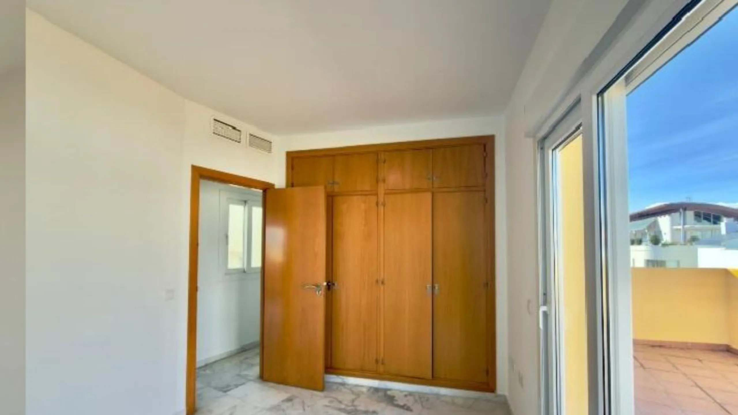 Exclusive penthouse for sale in Cancelada, Estepona, ideal for those seeking to enjoy the Costa del Sol lifestyle with generous outdoor space and a privileged location. The property stands out for its impressive terrace of approximately 80 m² with open vi