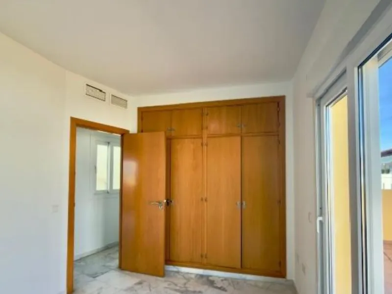 Exclusive penthouse for sale in Cancelada, Estepona, ideal for those seeking to enjoy the Costa del Sol lifestyle with generous outdoor space and a privileged location. The property stands out for its impressive terrace of approximately 80 m² with open vi