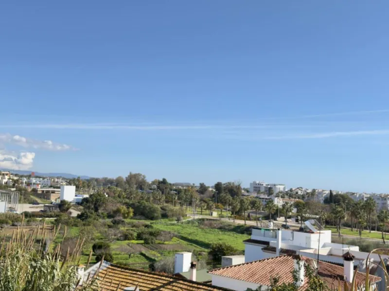 Exclusive penthouse for sale in Cancelada, Estepona, ideal for those seeking to enjoy the Costa del Sol lifestyle with generous outdoor space and a privileged location. The property stands out for its impressive terrace of approximately 80 m² with open vi