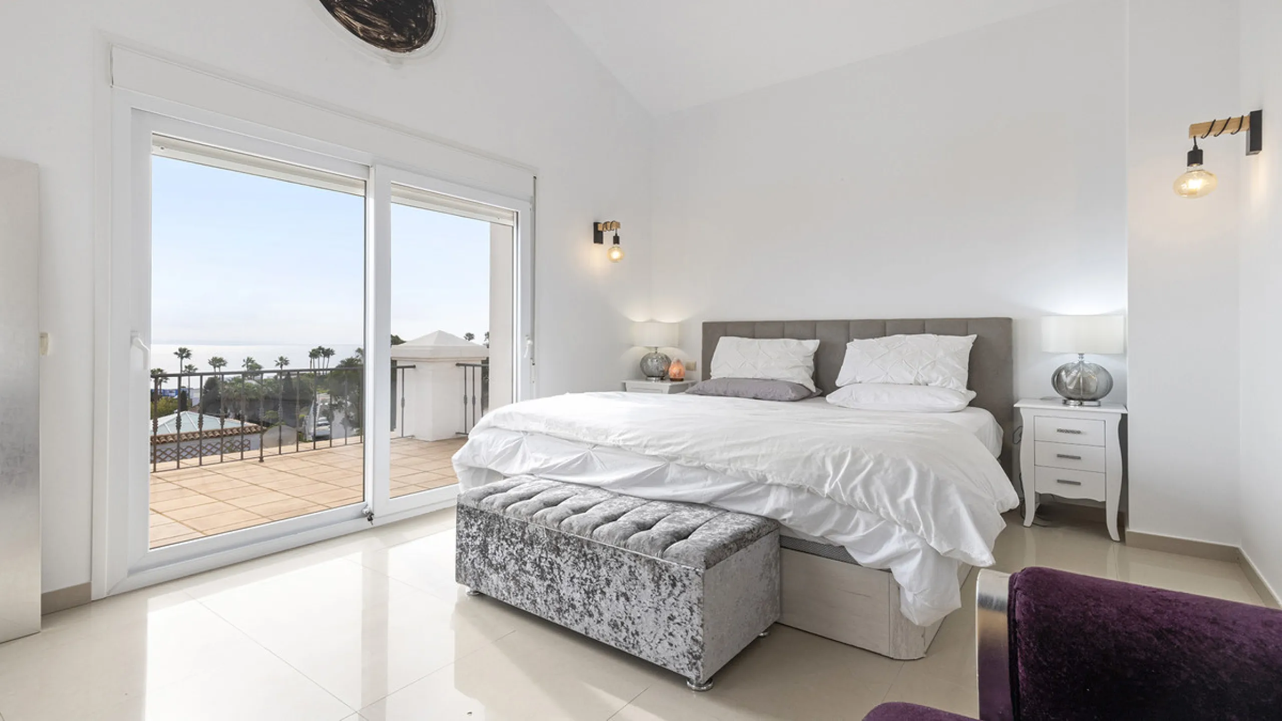 Step through the grand wooden doors into this stunning villa in La Paloma, perfectly positioned between the ports of Sotogrande and La Duquesa. Designed for relaxed Mediterranean living, this home combines elegance, comfort, and breathtaking sea views.