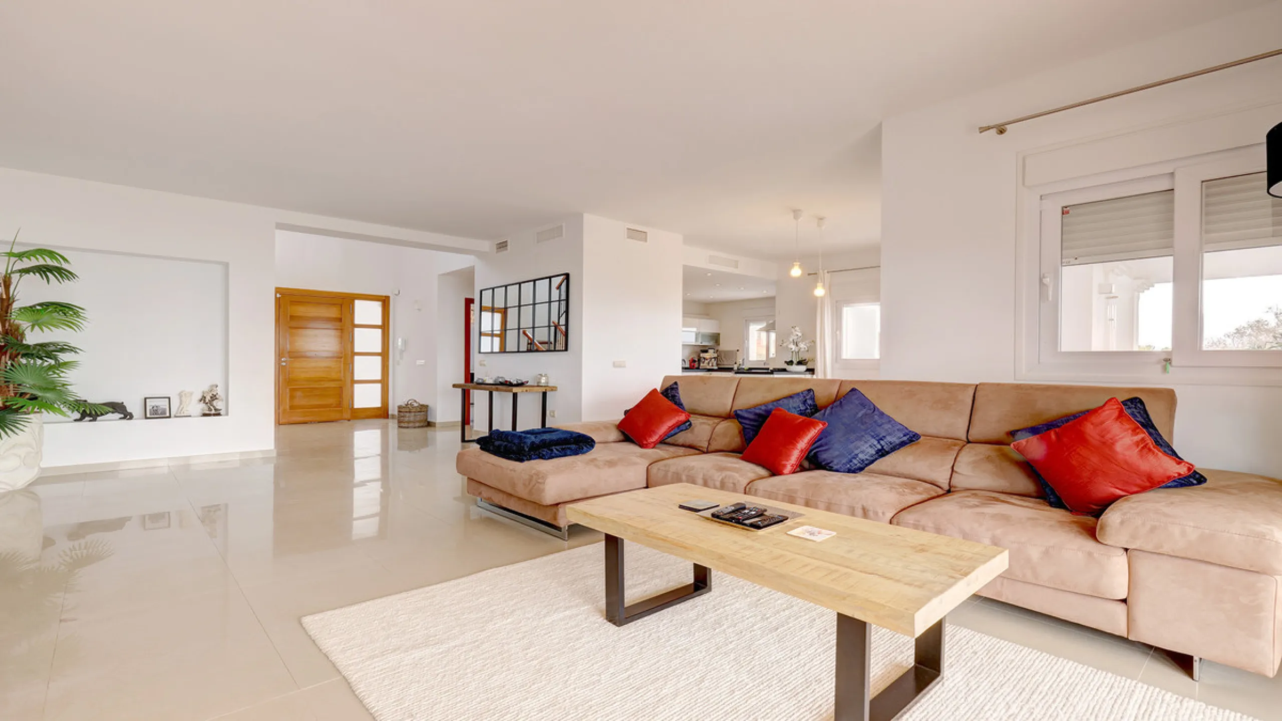 Step through the grand wooden doors into this stunning villa in La Paloma, perfectly positioned between the ports of Sotogrande and La Duquesa. Designed for relaxed Mediterranean living, this home combines elegance, comfort, and breathtaking sea views.