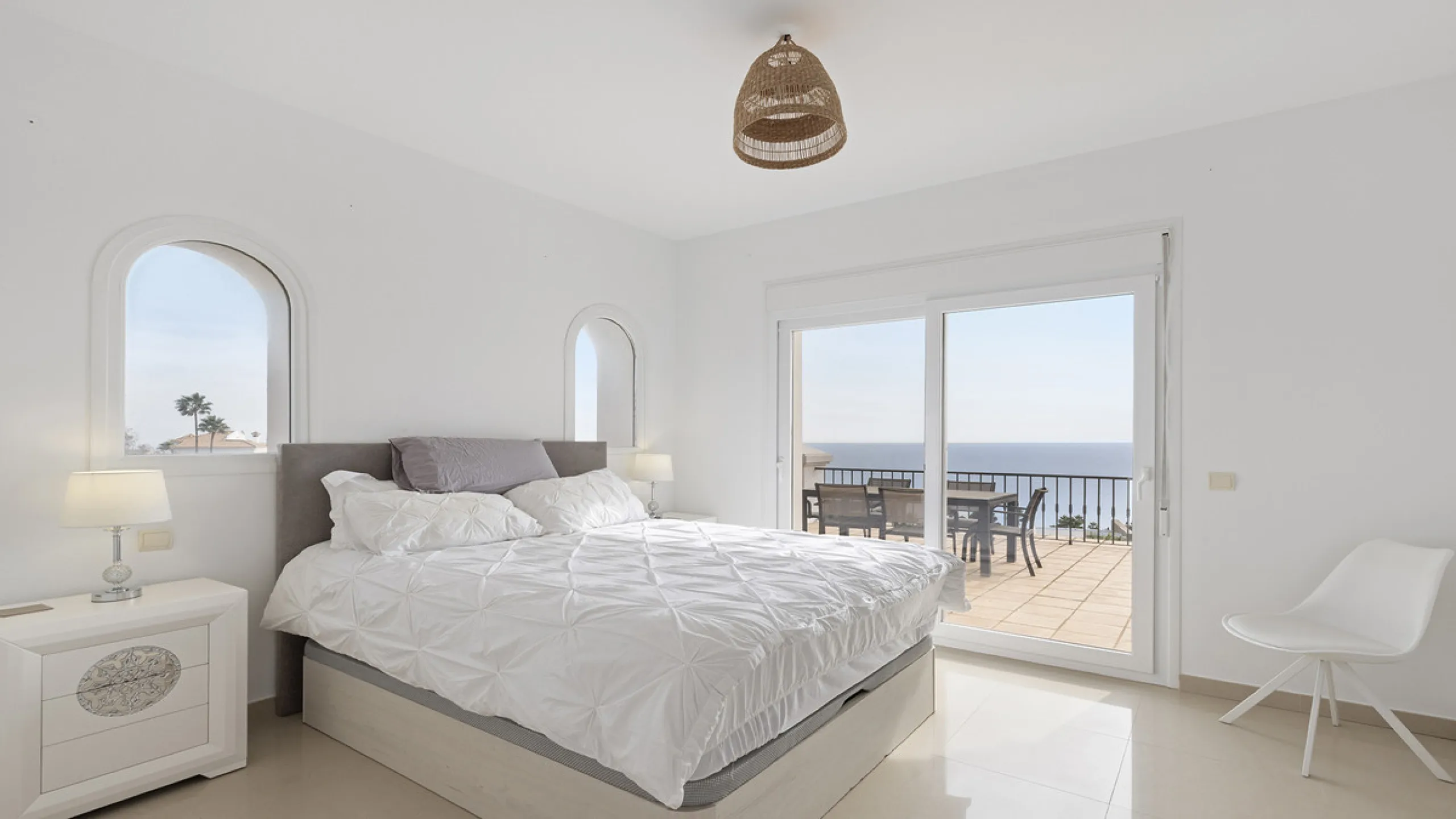 Step through the grand wooden doors into this stunning villa in La Paloma, perfectly positioned between the ports of Sotogrande and La Duquesa. Designed for relaxed Mediterranean living, this home combines elegance, comfort, and breathtaking sea views.