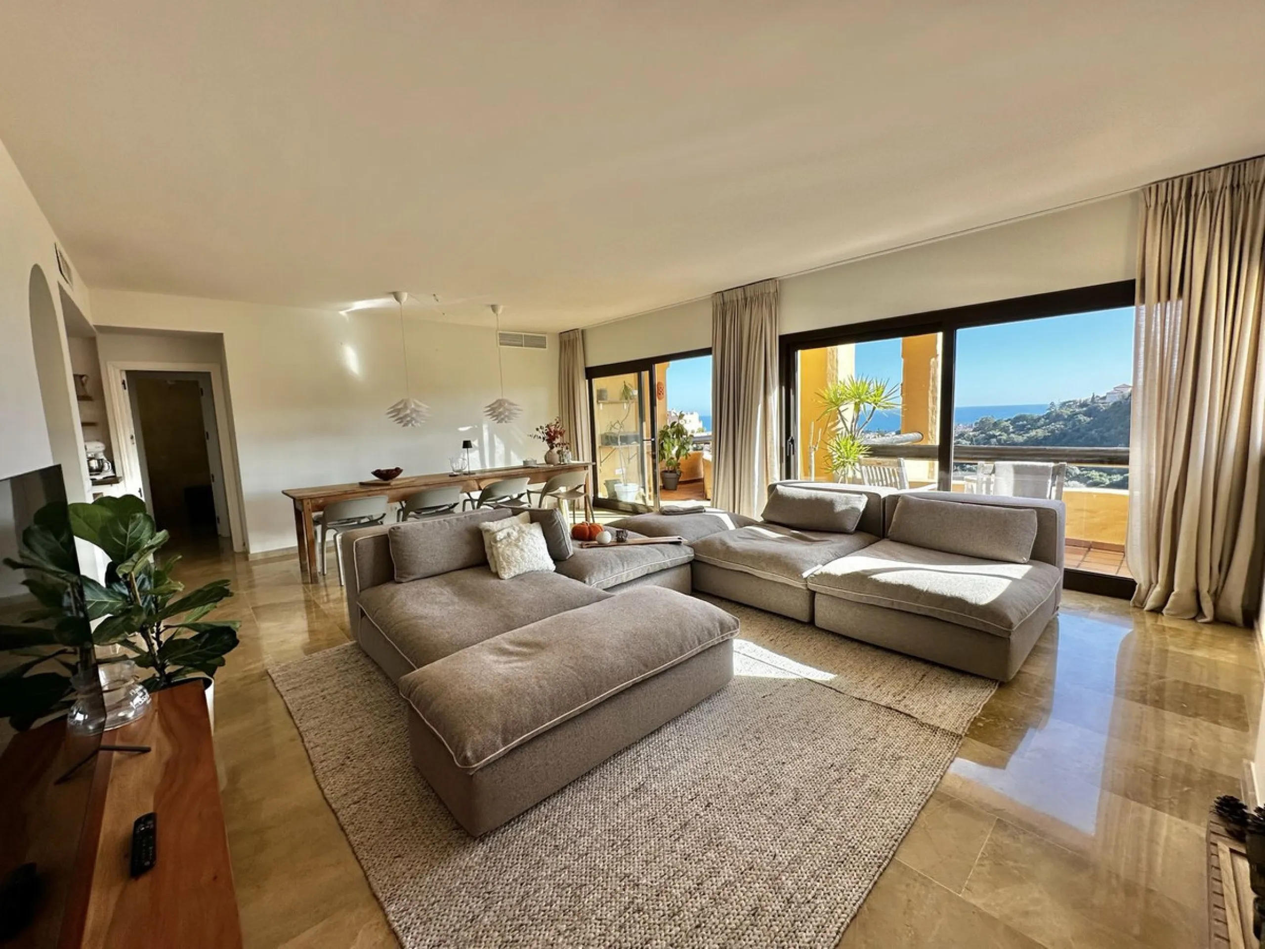 Stunning refurbished corner penthouse for sale in Coto Real La Duquesa, offering a rare opportunity to own a luxury three bedroom penthouse on the Costa del Sol. This exceptional property features panoramic sea views and golf views, making it an ideal cho