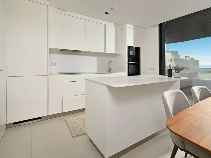 This modern apartment is situated in the sought-after area of El Higueron, Fuengirola, Malaga, offering a blend of comfort, style, and convenience. Boasting two spacious bedrooms and two bathrooms, including a luxurious en-suite, the property provides an 