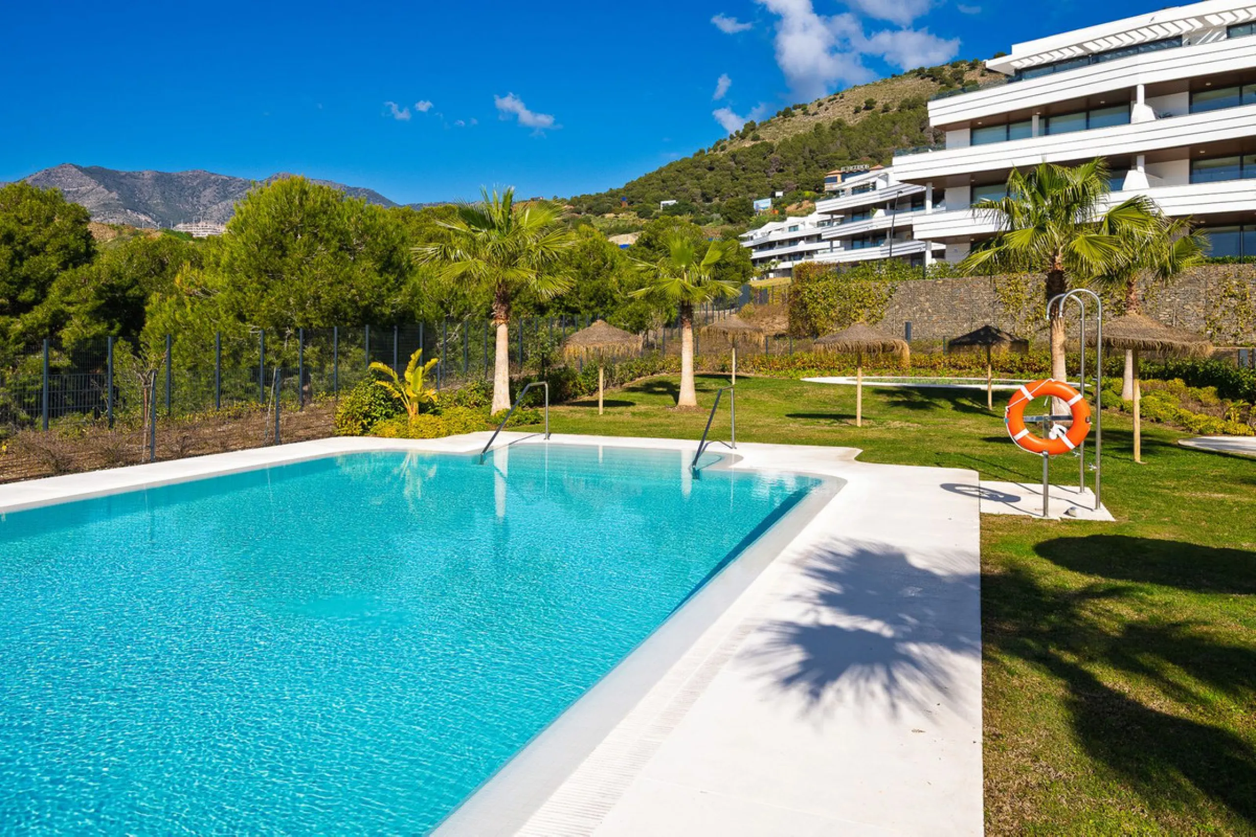 This modern apartment is situated in the sought-after area of El Higueron, Fuengirola, Malaga, offering a blend of comfort, style, and convenience. Boasting two spacious bedrooms and two bathrooms, including a luxurious en-suite, the property provides an 