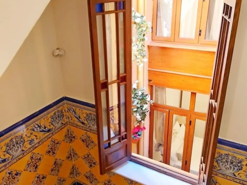 Located in the Historic Centre, this three-storey residential building with tourist license showcases a classic façade inspired by traditional Andalusian architecture and is arranged around a charming, flower-filled central patio. Fully renovated in 2025,
