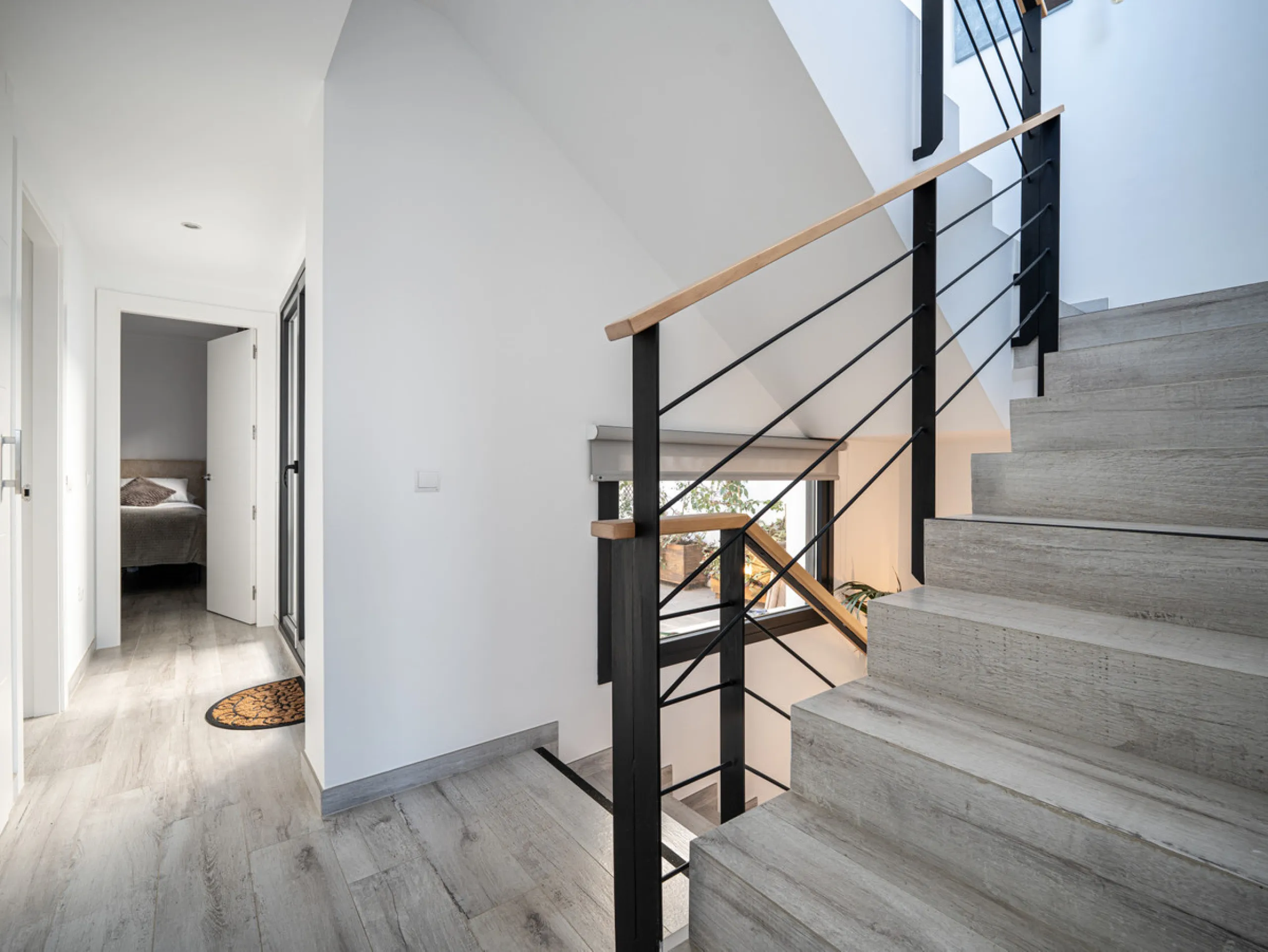 Casa Altavista is a south east facing luxury townhouse for sale with panoramic mountain sea and coastal views. It offers three bedrooms and three ensuite bathrooms within 172 m2 built. The modern spacious kitchen has a view and direct access to the intern