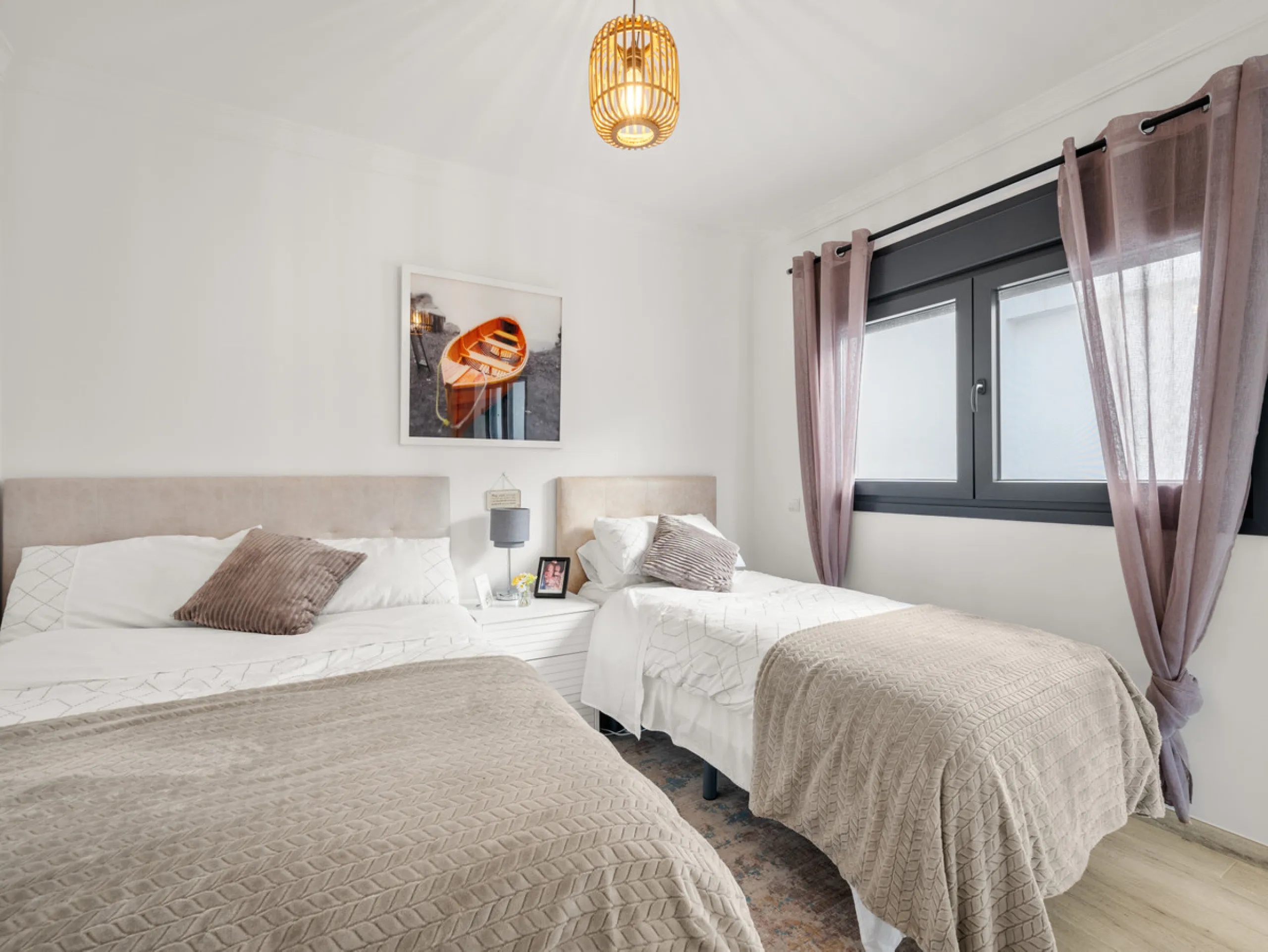 Casa Altavista is a south east facing luxury townhouse for sale with panoramic mountain sea and coastal views. It offers three bedrooms and three ensuite bathrooms within 172 m2 built. The modern spacious kitchen has a view and direct access to the intern