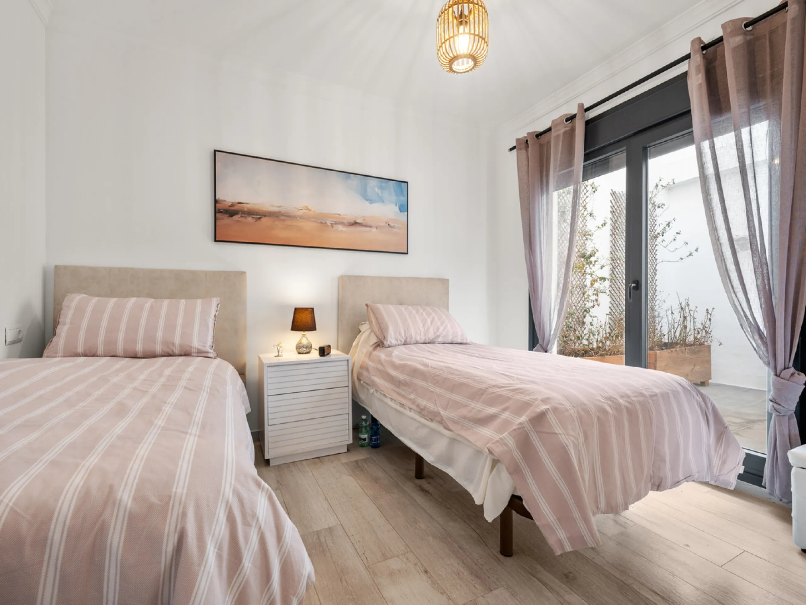 Casa Altavista is a south east facing luxury townhouse for sale with panoramic mountain sea and coastal views. It offers three bedrooms and three ensuite bathrooms within 172 m2 built. The modern spacious kitchen has a view and direct access to the intern
