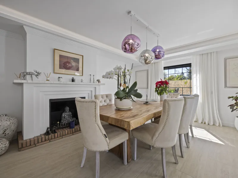 Discover this exceptional southwest-facing villa, a stunning blend of contemporary elegance and modern comfort. Recently refurbished with top-quality materials, this exquisite home boasts a sleek design that perfectly complements its surroundings. Located