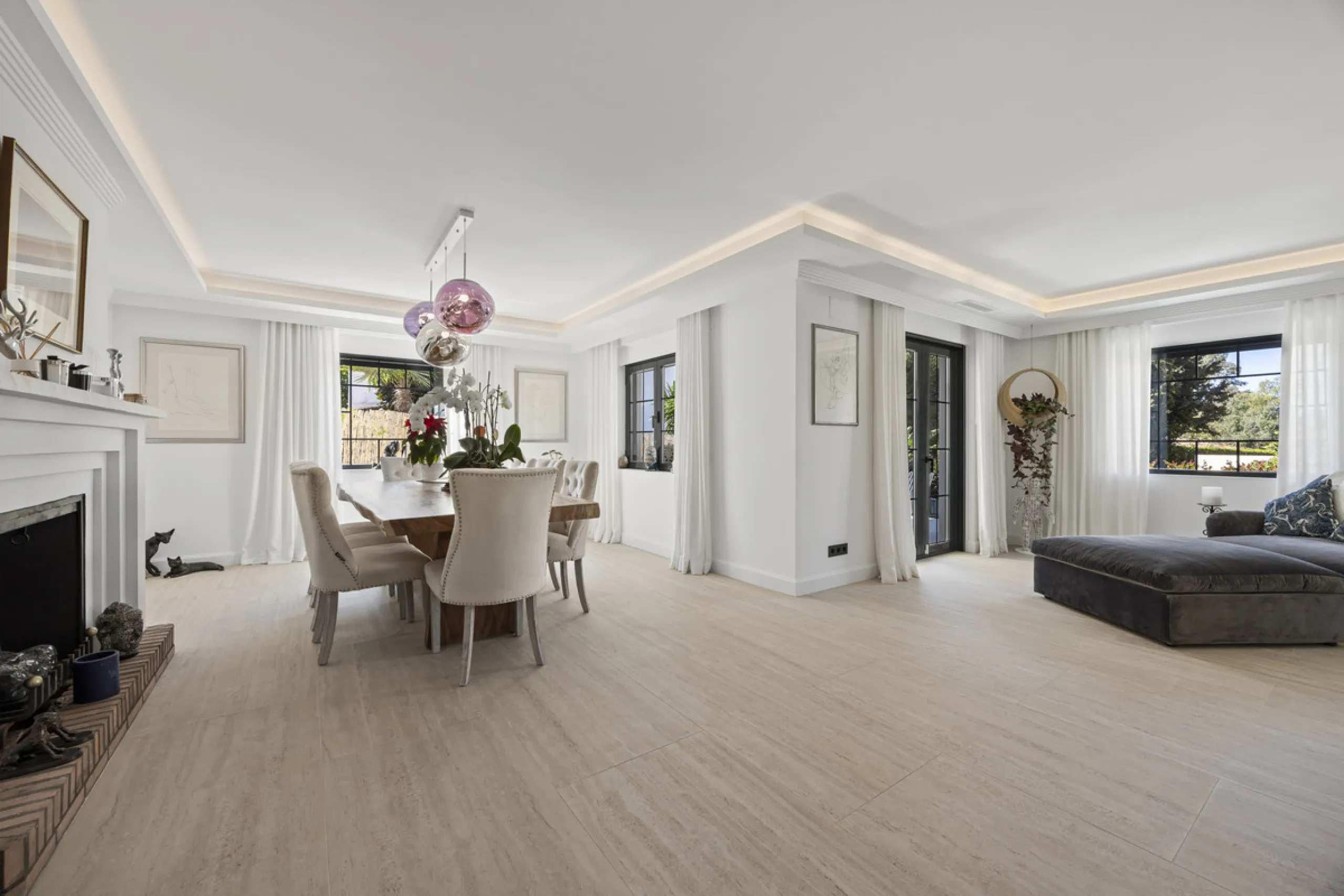 Discover this exceptional southwest-facing villa, a stunning blend of contemporary elegance and modern comfort. Recently refurbished with top-quality materials, this exquisite home boasts a sleek design that perfectly complements its surroundings. Located