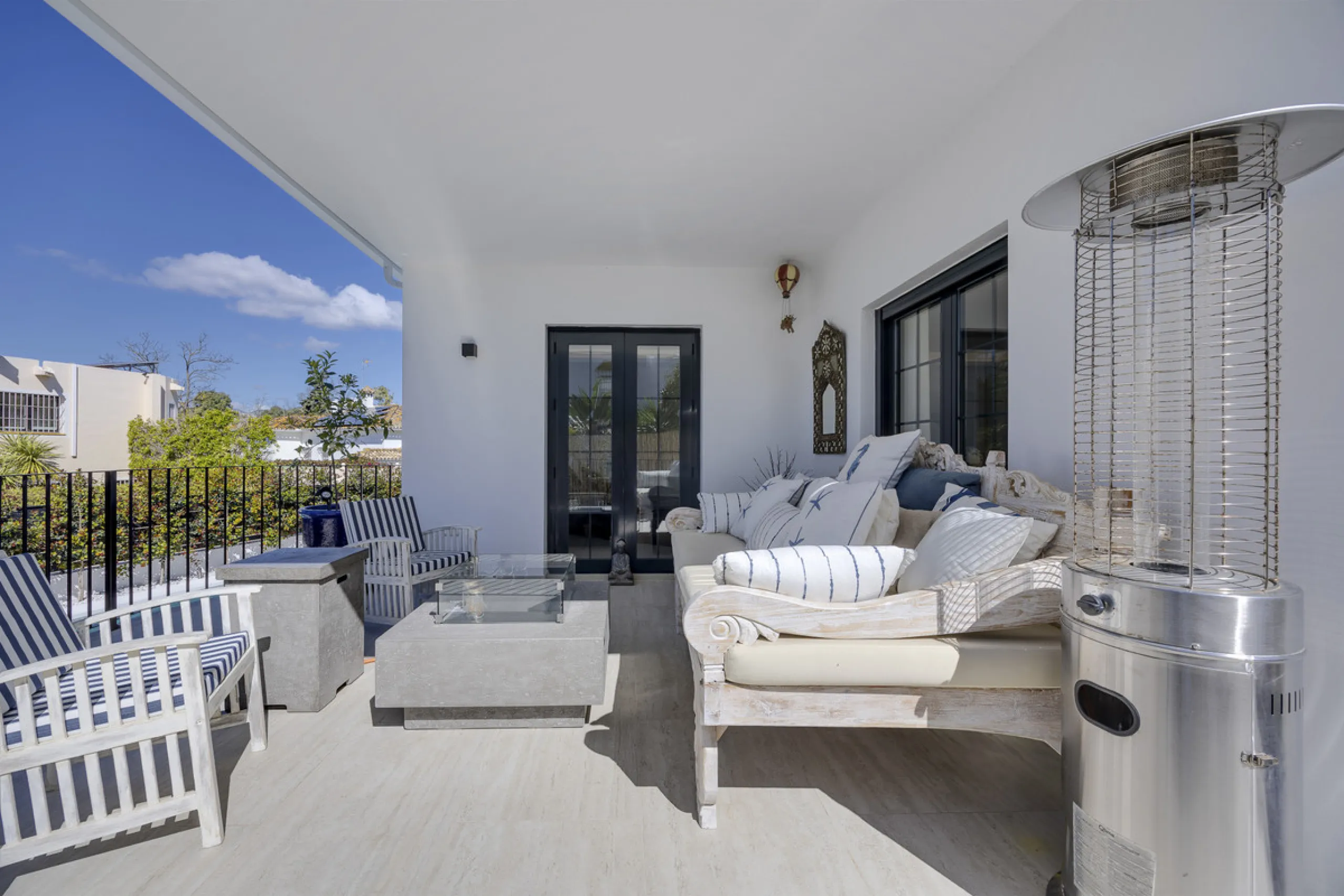 Discover this exceptional southwest-facing villa, a stunning blend of contemporary elegance and modern comfort. Recently refurbished with top-quality materials, this exquisite home boasts a sleek design that perfectly complements its surroundings. Located
